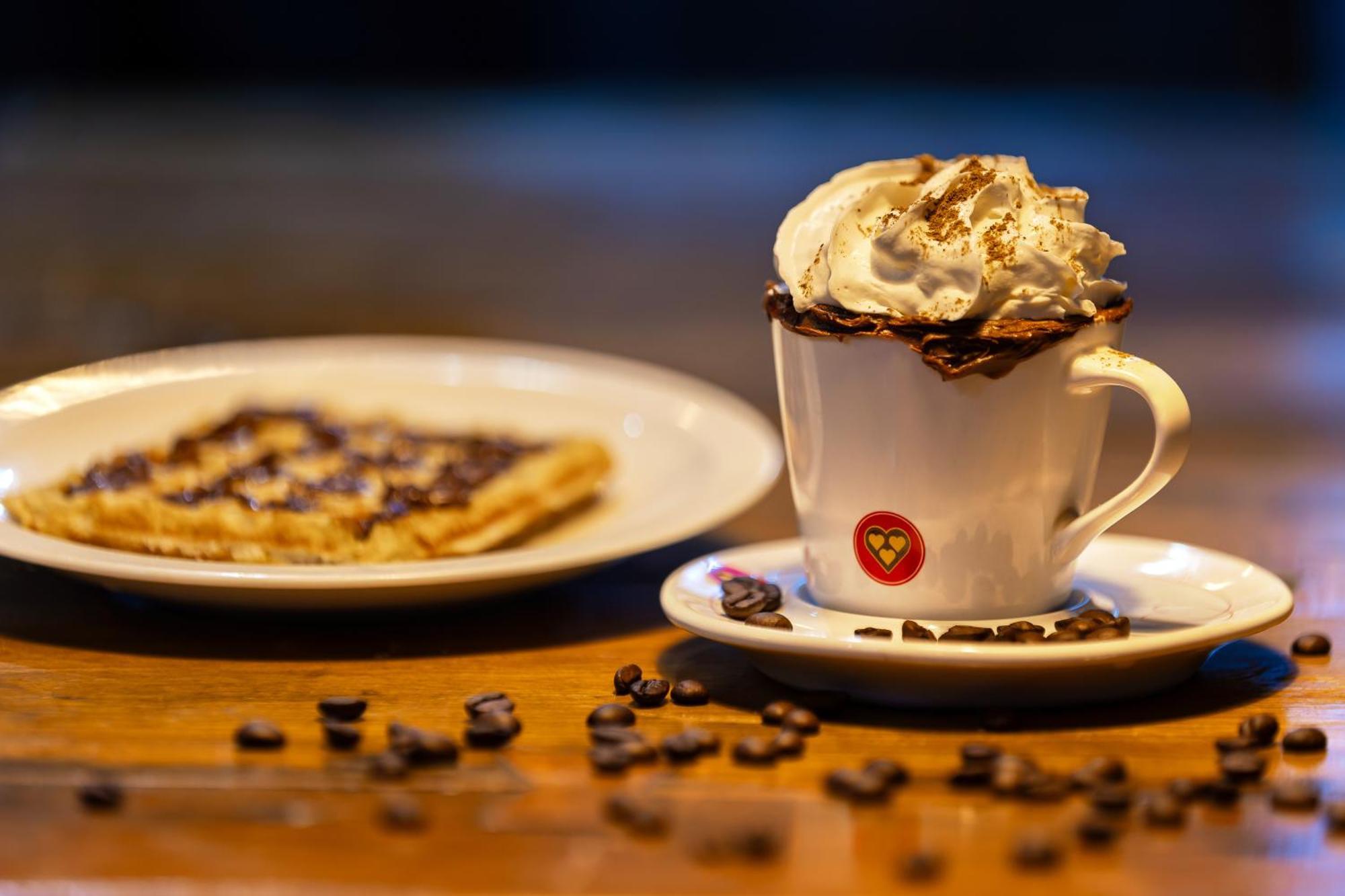 Golden Park All Inclusive Poços de Caldas Exterior foto A cup of coffee